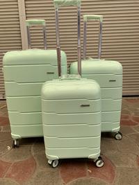 Купить сумку Three birds Комплект чемоданов  мятного цвета