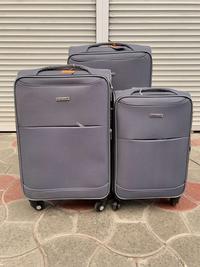 Купить сумку Travel world Комплект чемоданов Китай  серый